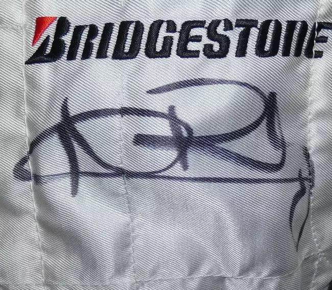Williams 2009 driver promotional race suit signed by Rosberg and Nakajima